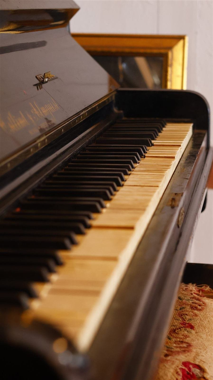 A vintage piano in the Van Gaalen function room