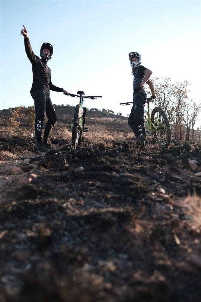 Two riders pausing at the top of the Concrete Hill climb at Van Gaalen